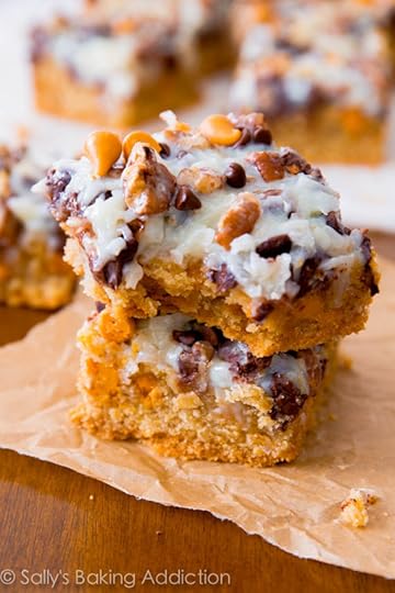 Ultimate Magic Cookie Bars with butterscotch, chocolate, and coconut! Get the recipe at sallysbakingaddiction.com