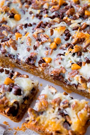 Ultimate Magic Cookie Bars with butterscotch, chocolate, and coconut! Get the recipe at sallysbakingaddiction.com
