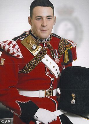 Fusilier Lee Rigby poses in his ceremonial uniform: His family were overcome with emotion as the jury returned their verdicts yesterday
