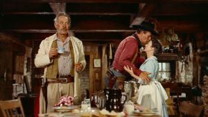 Ethan kissing his brother's wife...Ward Bond is obviously aware of the situation.