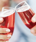 Two people toasting