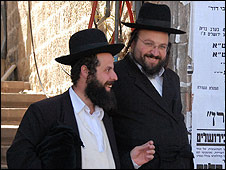 Ultra-orthodox Jews joke in Mea Shearim, Jerusalem