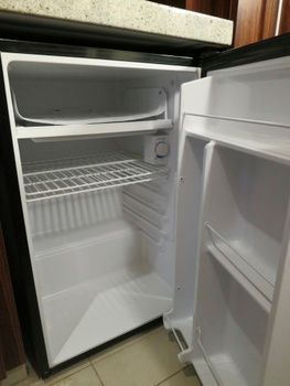You'll find a refrigerator in your Disney hotel room, but there's no mini bar.