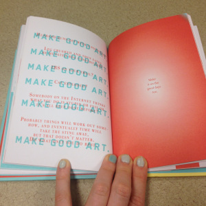 Notice how my nails go with the color scheme of the book. Very classy.