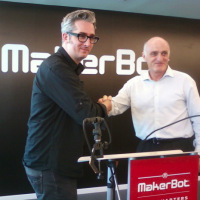 In June, 3D printing giant Stratasys announced that it was buying maker-focused, consumer 3D printing firm MakerBot for $403 million.<br /><br />That's MakerBot co-founder and CEO Bre Pettis, left, shaking hands with Stratasys CEO David Reis. <br /><br />The deal was the first high-profile example of a traditional manufacturing company buying a funky, consumer-facing maker brand.