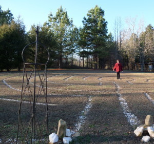 woman standing in labyrinth center