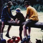 Overcoming an obstacle with the help of my fellow scouts.