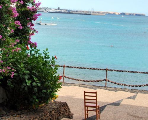 Chair looking out to sea (c) Kristin Espinasse