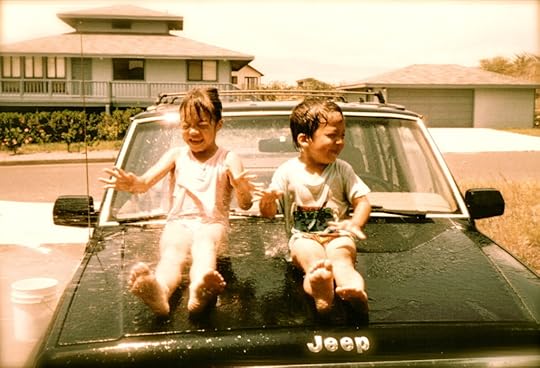 From our family album when my own Social Darwikians were young: Laughing, they climbed up onto our car hood while their dad was washing it, fully knowing what would come next, and jubilantly embracing every moment of it.