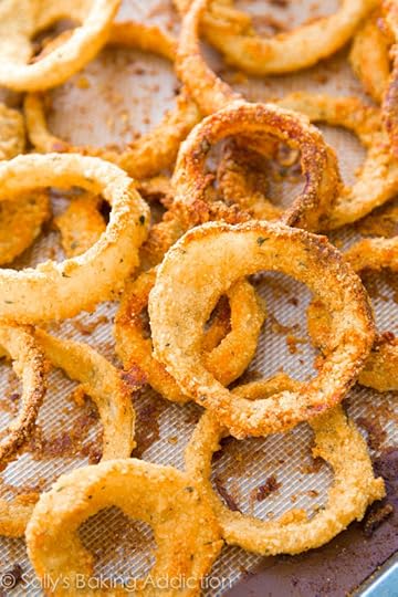 How to Make Crispy Baked Onion Rings. Made in the oven, not the frier. Much healthier! Recipe at sallysbakingaddiction.com