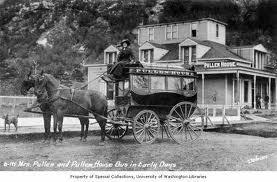 Harriet in front of her hotel with her new stage coach.