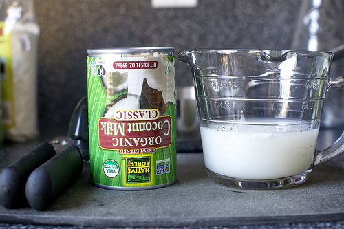 chilled coconut milk, inverted, milk poured off