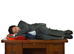 Tired Businessman Having A Sleep