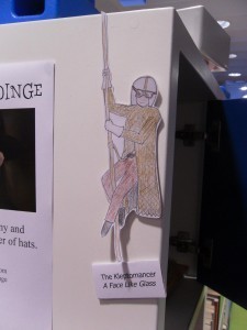 I love the way he's abseiling down the poster.