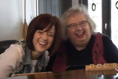 Annie and Lizzie Laughing at the Farm