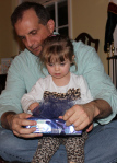 I don't think Papa knows how to open gifts.