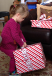 Opening gifts is tough work, but I'll take the job.