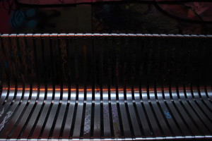 Reflections on park bench