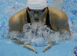 China's Ye Shiwen swims in her semifinal of the women's 200-meter individual medley at the Aquatics Centre in the Olympic Park during the 2012 Summer Olympics in London, Monday, July 30, 2012.
