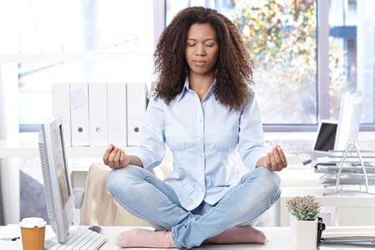 woman on desk meditating