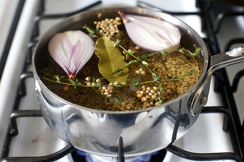 lentils cooking with bay, thyme and shallot