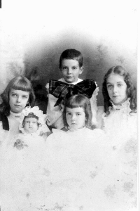 Elsie (holding her lifelike wax doll),Alice & Hylinda. Gilman is Elsie's brother who died when he was 14.