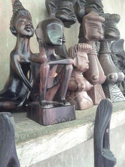 A Bul-ol, the Ifugao god of harvest, and other wooden crafts by the people of Batad.