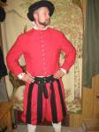 The under layer. The red jacket is buttoned/tied to the pants, as was the custom.