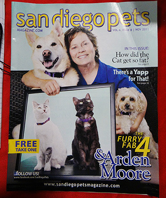 An issue of San Diego Pets Magazine with Arden, Zeki and her other four-legged family on the cover
