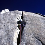 Getting some wide on A Fine Piece. (Tragically blurry, possibly due to a rare instance of Jim keeping one hand on the belay while taking a photo...)