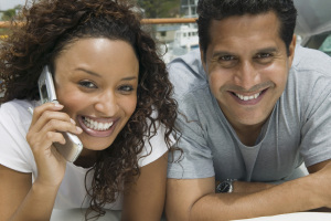 031859083-woman-call-lying-beside-man