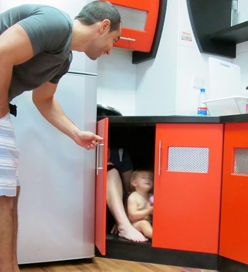 Any cupboard can accommodate a little kid. These were so roomy that mom <br />could fit too!