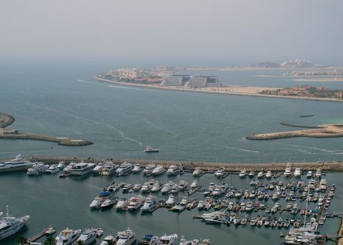 Beyond the marina, you can see the ring encircling Palm Jumeirah Island.