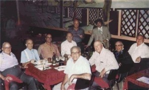 L to R: Joey Aiuppa, Dom DiBella, Vince Solano, Al Pilotto; standing, L to R: Jackie Cerone and Joey Lombardo; front row, L to R: Tony Accardo, Joe Amato, Caesar DiVarco, and Jimmy “Turk” Torello