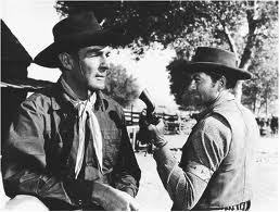 Randolph Scott (left) in