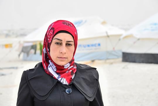 Asmaa, she had been freed from a regime prison. The Free Syria Army made a prisoner swap to gain her freedom. She was in prison for 13 months. She told how she was tortured as they tried to make her say the names of those she was working with. She is the fiancee of Abdul Razzaq Tlass, the first grade officer from the Syrian army. Photograph by Russell Chapman © Copyright 2013