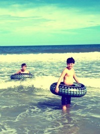 boys on tubes at Carolina Beach