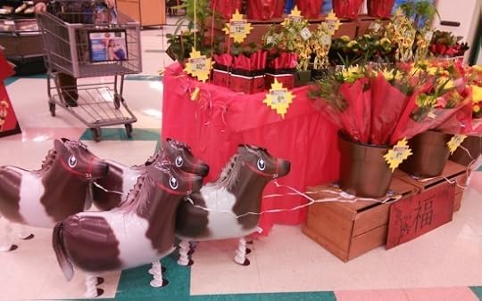 Adorable ballon ponies become part of the celebration at Sally's local grocery store.