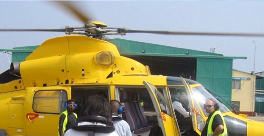 APPROACHING THE CHOPPER (Photo courtesy of Tullow Oil)