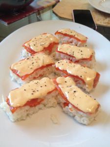 Her version of salmon oshi sushi.