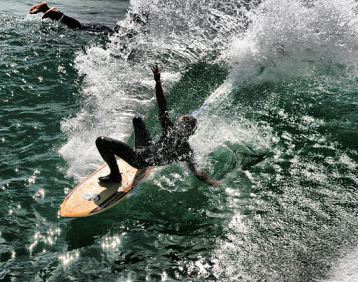 512px-Falling_surfer