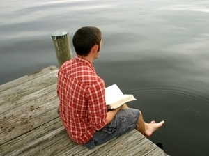 Reading on a dock