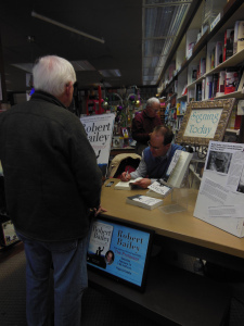 Signing another copy.