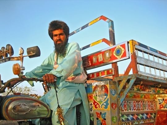 Muslim man at Ludiya riding a jugaad