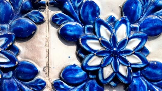 The tiles on the buildings drew me to them. 