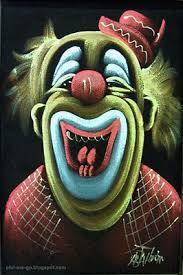 Clowns painted on velvet.