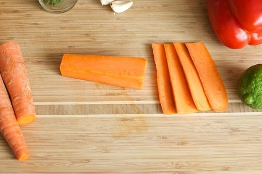 trimming and slicing carrots
