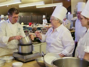 My mother-in-law telling the chef how it's done in the old country.