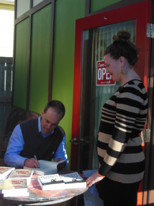 Signing another copy!