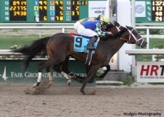 Intense Holiday wins the Risen Star Stakes at the Fair Grounds on Feb. 22, 2014.